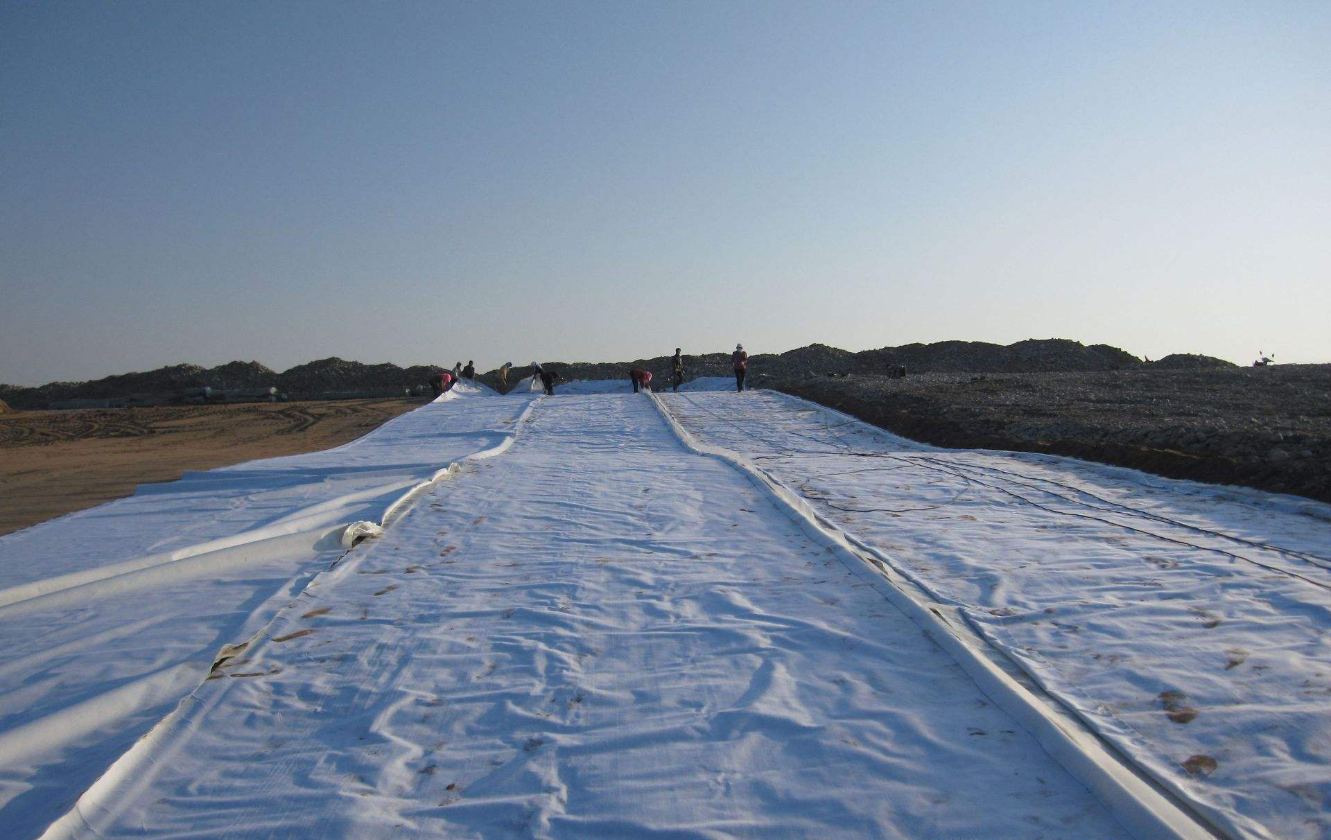 复合91视频直播APP膜对坝体和坝前库底进行防渗处理的方案